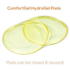 Two translucent yellow hydrogel pads are positioned on a white background. The pads are oval-shaped and slightly curved, indicating flexibility. Above the pads, the text "ComfortGel HydroGel Pads" is displayed in a bold, modern font. Below the pads, in a smaller font, the phrase "Pads can be rinsed & reused!" is featured, emphasizing their practical use.