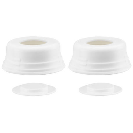 Four white, circular plastic items are displayed. Two larger items on the left are slightly taller and have ridges around the base, featuring a central opening at the top. The two smaller, flat pieces on the right are circular lids that fit over the openings of the larger items. The overall appearance is simple, with a clean and glossy finish.