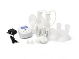 A collection of breast pump components arranged on a white background. The main items include a small white electronic pump with a digital display showing a timer reading 0:46, a power adapter connected to the pump, and several transparent plastic containers for milk collection, including two larger bottles with white flanges and tubes leading from the pump. There are also small white caps on the side and additional small components, likely for various attachments. 