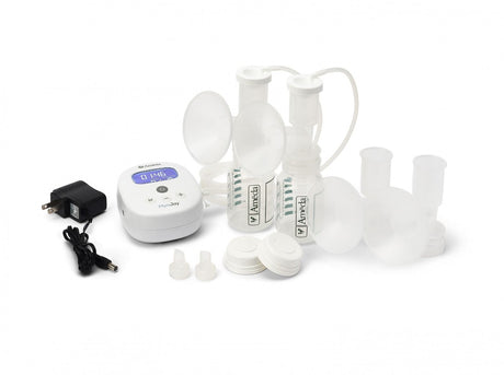 A collection of breast pump components arranged on a white background. The main items include a small white electronic pump with a digital display showing a timer reading 0:46, a power adapter connected to the pump, and several transparent plastic containers for milk collection, including two larger bottles with white flanges and tubes leading from the pump. There are also small white caps on the side and additional small components, likely for various attachments. 